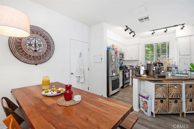 29 Quartz Ln, Ladera Ranch, CA 92694 - dining room with wood finished floors and rail lighting