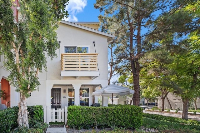 29 Quartz Ln, Ladera Ranch, CA 92694 - view of front of home with a balcony and stucco siding