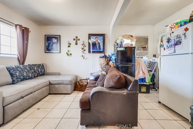 1270 S Hicks Ave, Los Angeles, CA 90023 - living area with light tile patterned floors