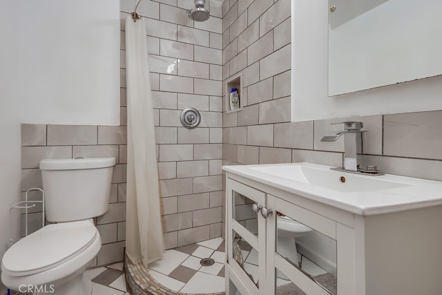 1270 S Hicks Ave, Los Angeles, CA 90023 - bathroom featuring tile walls, a tile shower, and vanity