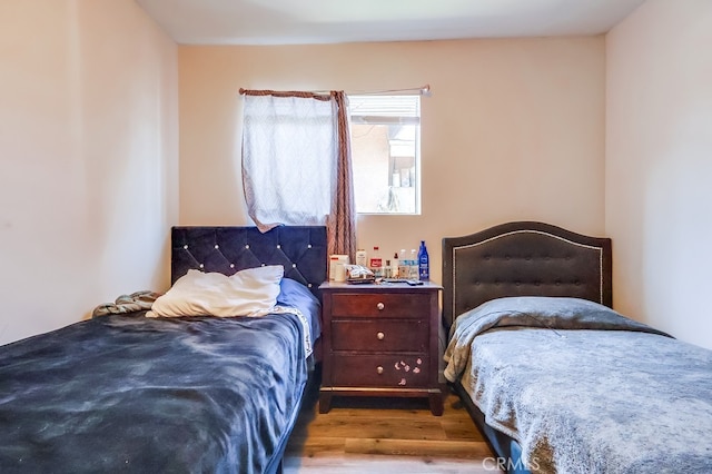 1270 S Hicks Ave, Los Angeles, CA 90023 - bedroom with wood finished floors