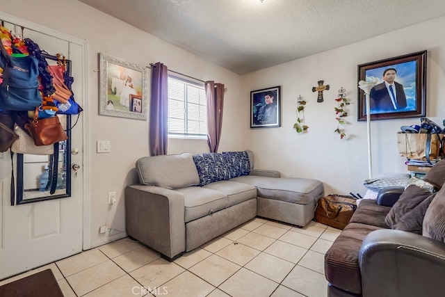 1270 S Hicks Ave, Los Angeles, CA 90023 - living area with light tile patterned flooring and a textured ceiling