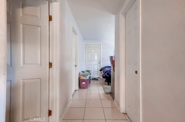 1270 S Hicks Ave, Los Angeles, CA 90023 - hallway with light tile patterned flooring and baseboards