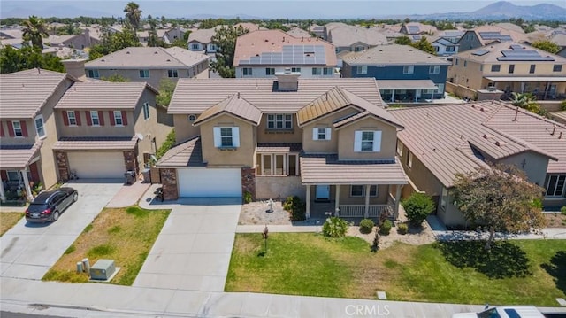 6330 La Mesa St, Eastvale, CA 92880 - aerial view of residential area featuring a mountainous background