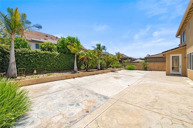 6330 La Mesa St, Eastvale, CA 92880 - fenced backyard featuring a patio