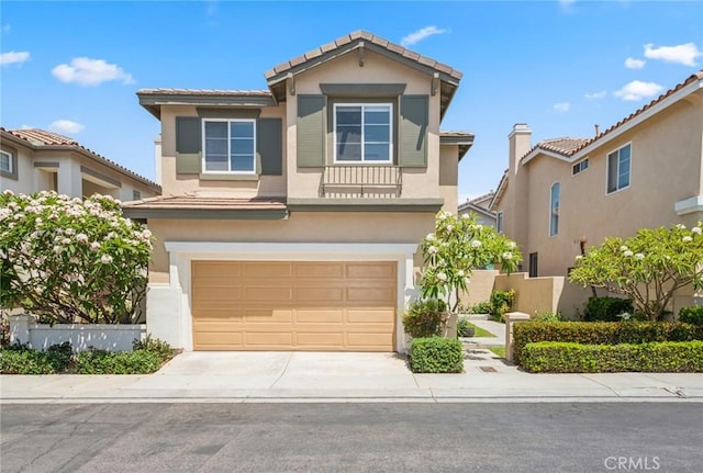 1757 Pierce Ln, Placentia, CA 92870 - traditional-style home with stucco siding, an attached garage, a tile roof, and driveway