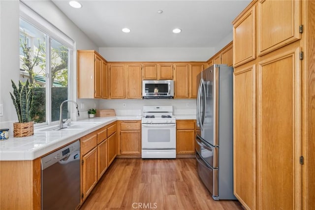 1757 Pierce Ln, Placentia, CA 92870 - kitchen with stainless steel appliances, light wood finished floors, light countertops, and recessed lighting