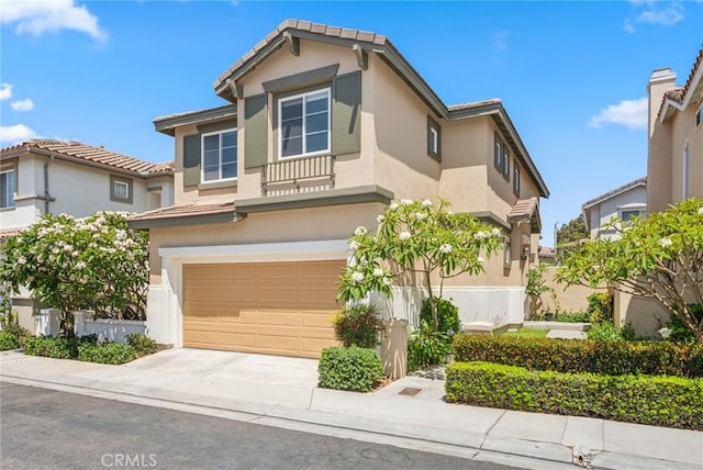 1757 Pierce Ln, Placentia, CA 92870 - view of front of home with stucco siding, a garage, a tile roof, and concrete driveway