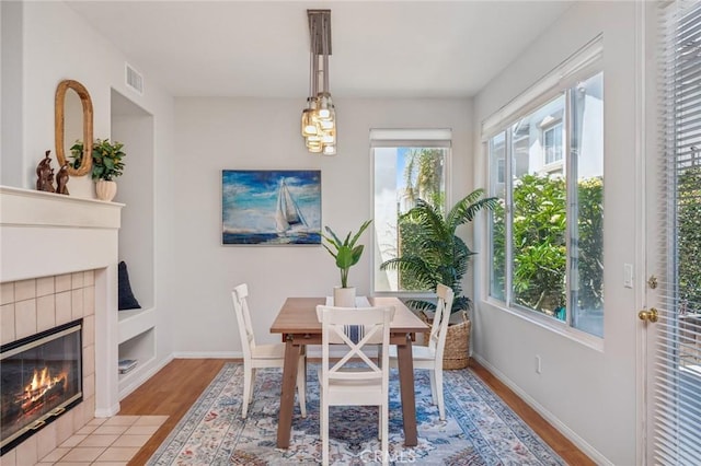 1757 Pierce Ln, Placentia, CA 92870 - dining area with wood finished floors and a fireplace