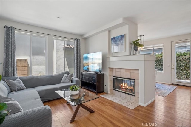 1757 Pierce Ln, Placentia, CA 92870 - living room featuring wood finished floors and a tiled fireplace