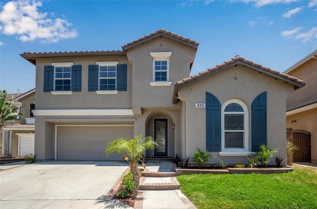 420 Augusta Ln, Placentia, CA 92870 - view of front facade featuring a tile roof, stucco siding, a garage, and driveway