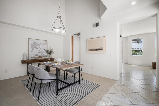 420 Augusta Ln, Placentia, CA 92870 - dining area featuring a high ceiling, light tile patterned flooring, and light carpet