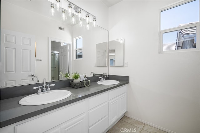 420 Augusta Ln, Placentia, CA 92870 - bathroom with double vanity, tile patterned floors, and a shower with door