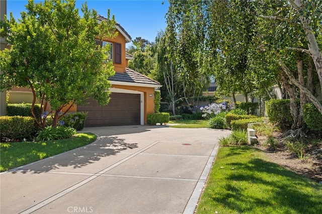 61 Clermont, Newport Coast, CA 92657 - garage with concrete driveway