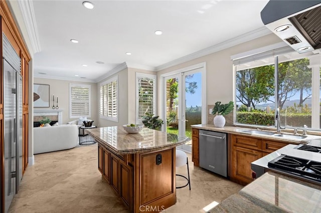 61 Clermont, Newport Coast, CA 92657 - kitchen with stainless steel dishwasher, crown molding, light stone counters, brown cabinets, and a breakfast bar area