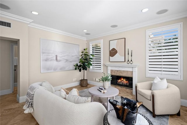 61 Clermont, Newport Coast, CA 92657 - living area with a premium fireplace, ornamental molding, and recessed lighting