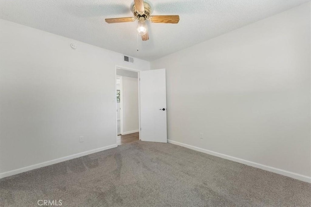 21999 Riverside Ave, Red Bluff, CA 96080 - spare room featuring carpet floors, ceiling fan, and a textured ceiling
