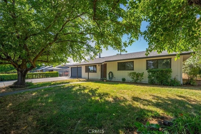 21999 Riverside Ave, Red Bluff, CA 96080 - ranch-style house with an attached garage, driveway, and a front yard