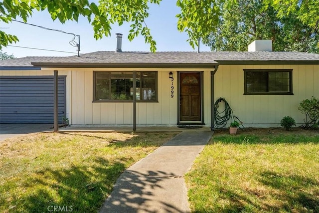 21999 Riverside Ave, Red Bluff, CA 96080 - ranch-style house featuring a garage and a front yard