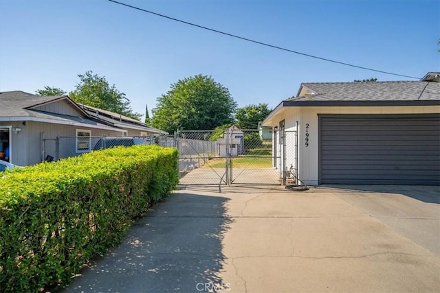 21999 Riverside Ave, Red Bluff, CA 96080 - view of property exterior featuring a gate and driveway