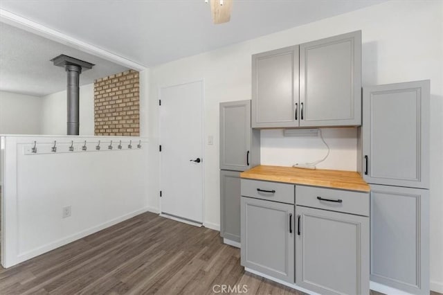 21999 Riverside Ave, Red Bluff, CA 96080 - kitchen with gray cabinetry, wood finished floors, and butcher block counters