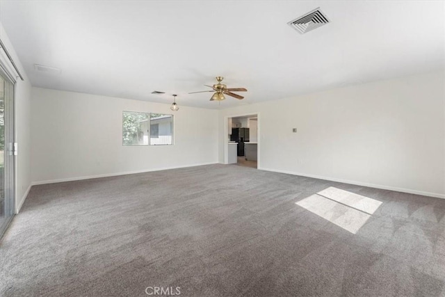 21999 Riverside Ave, Red Bluff, CA 96080 - carpeted empty room with a ceiling fan and baseboards