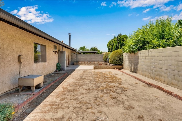 353 E Woodcroft Ave, Glendora, CA 91740 - fenced backyard with a patio area