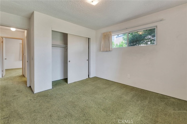 353 E Woodcroft Ave, Glendora, CA 91740 - unfurnished bedroom featuring carpet, a closet, and a textured ceiling
