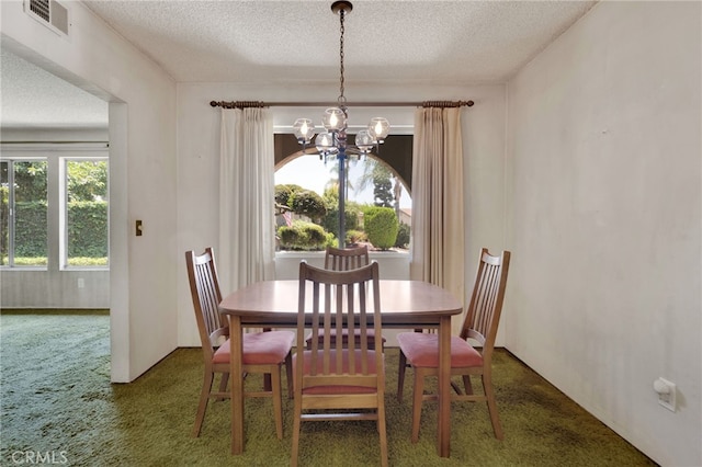 353 E Woodcroft Ave, Glendora, CA 91740 - carpeted dining area featuring a chandelier and a textured ceiling