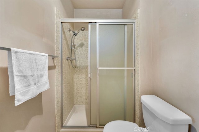 353 E Woodcroft Ave, Glendora, CA 91740 - bathroom featuring toilet and a shower stall