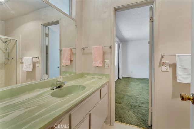 353 E Woodcroft Ave, Glendora, CA 91740 - bathroom featuring vanity, a stall shower, and a textured ceiling