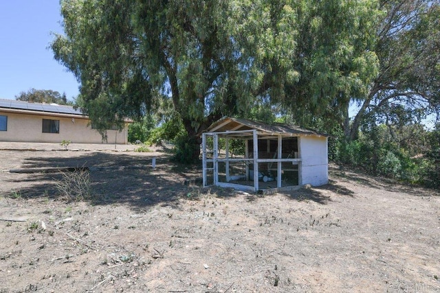3096 Coral Tree Ln, Fallbrook, CA 92028 - view of yard with exterior structure and an outdoor structure