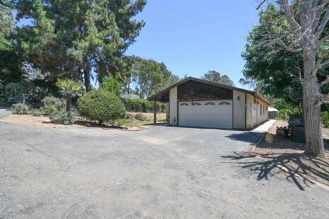 3096 Coral Tree Ln, Fallbrook, CA 92028 - view of front of house featuring driveway and an outdoor structure