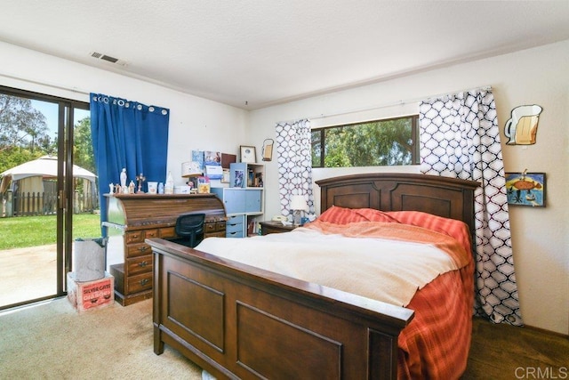 3096 Coral Tree Ln, Fallbrook, CA 92028 - carpeted bedroom with access to outside and multiple windows