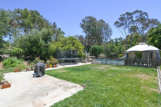 3096 Coral Tree Ln, Fallbrook, CA 92028 - view of yard with a trampoline and a patio area
