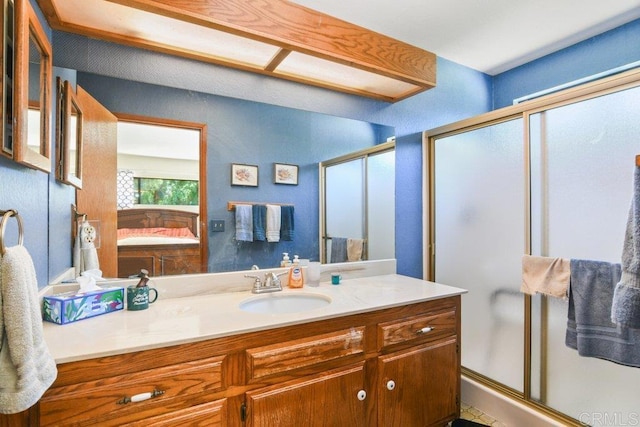 3096 Coral Tree Ln, Fallbrook, CA 92028 - bathroom with a shower stall, vanity, and ensuite bathroom