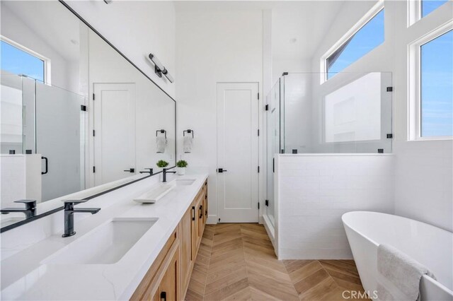 2102 Marshallfield Ln Unit A, Redondo Beach, CA 90278 - bathroom featuring healthy amount of natural light, double vanity, and a shower stall