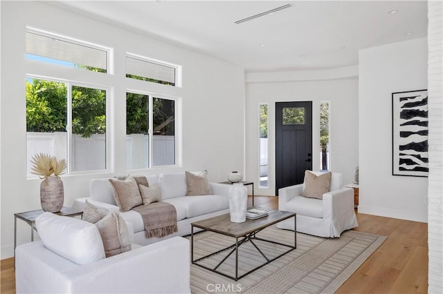 2102 Marshallfield Ln Unit A, Redondo Beach, CA 90278 - living area featuring plenty of natural light and wood finished floors