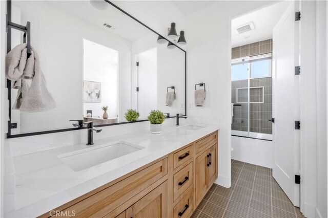 2102 Marshallfield Ln Unit A, Redondo Beach, CA 90278 - bathroom with double vanity, enclosed tub / shower combo, and tile patterned floors