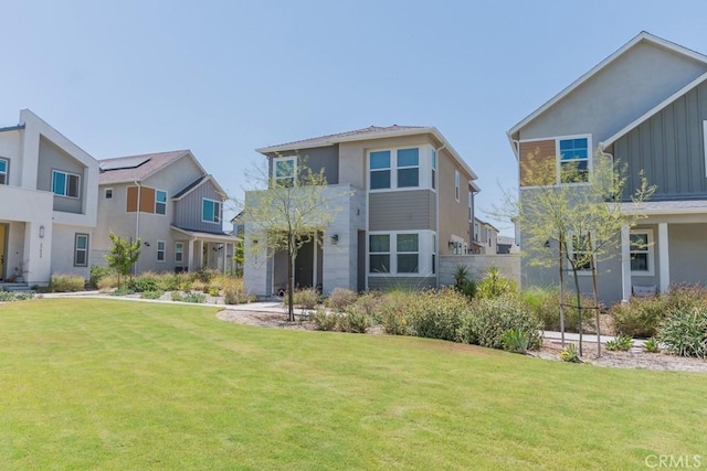 27474 Quiet View Pl, Valencia, CA 91381 - view of front of property featuring stucco siding, a front lawn, board and batten siding, and a residential view