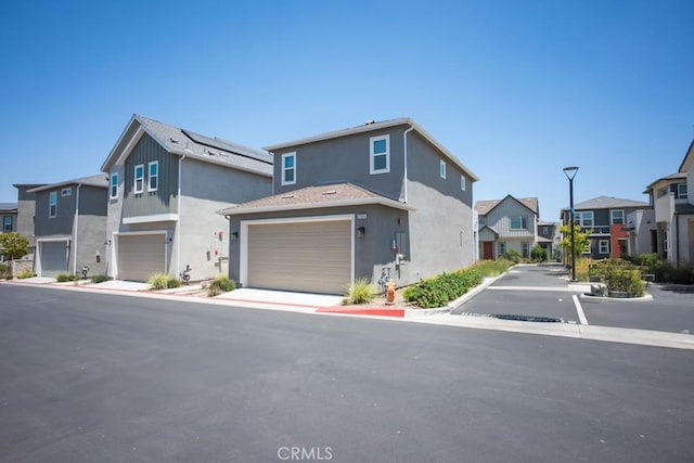 27474 Quiet View Pl, Valencia, CA 91381 - view of asphalt street with street lights and a residential view