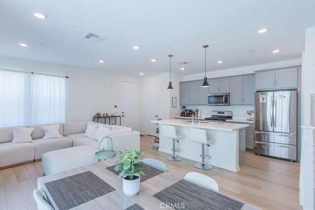 27474 Quiet View Pl, Valencia, CA 91381 - dining room featuring light wood-style flooring and recessed lighting