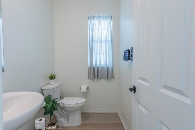 27474 Quiet View Pl, Valencia, CA 91381 - half bathroom with a sink and wood finished floors