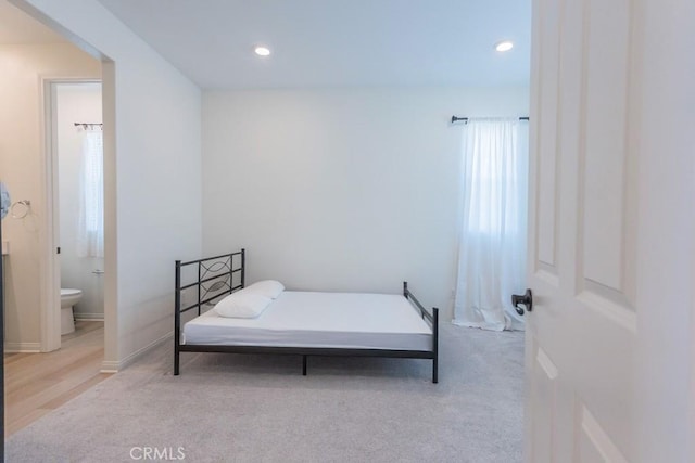 27474 Quiet View Pl, Valencia, CA 91381 - bedroom with light carpet, recessed lighting, and ensuite bath