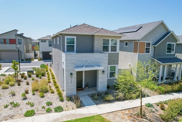 27474 Quiet View Pl, Valencia, CA 91381 - view of front of house with stucco siding, a shingled roof, a residential view, and board and batten siding