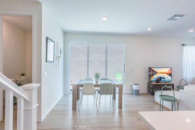 27474 Quiet View Pl, Valencia, CA 91381 - dining room with healthy amount of natural light, light wood-style floors, and recessed lighting
