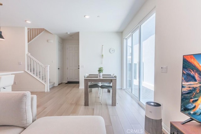 27474 Quiet View Pl, Valencia, CA 91381 - living area featuring stairs, light wood finished floors, and recessed lighting