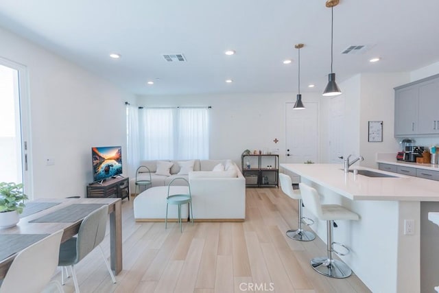 27474 Quiet View Pl, Valencia, CA 91381 - living room featuring light wood-style floors and recessed lighting