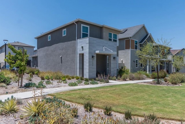 27474 Quiet View Pl, Valencia, CA 91381 - view of front of house featuring stucco siding and a front lawn