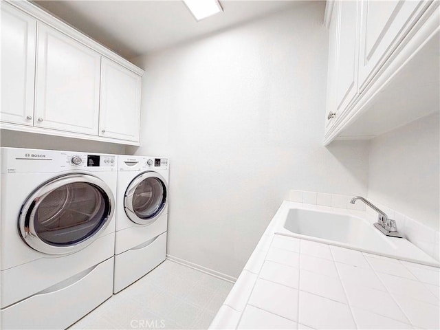3090 Mangular Ave, Corona, CA 92882 - laundry area with cabinet space and washer and clothes dryer